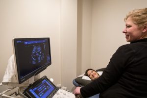 A patient having an ultrasound performed