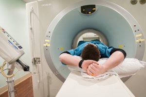 A patient undergoing a CT scan